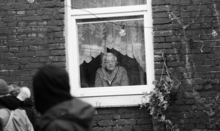 grayscale photo of man and woman in frame