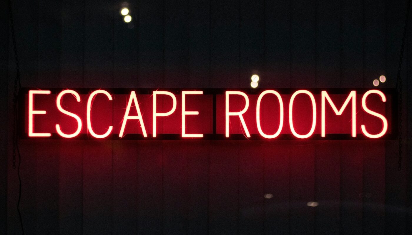 red escape rooms neon sign